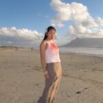 Model poses at beach